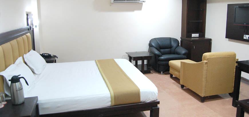 A guest room seen from the doorway.