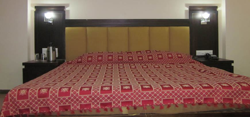 A guest room with a seating corner.