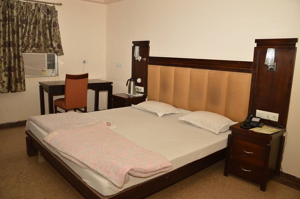 A Super Room with carved wooden furniture.